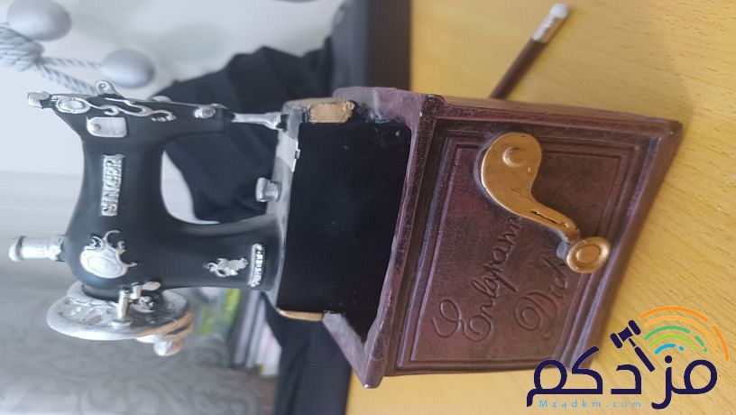 تمثال مكينة خياطه